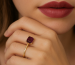 Woman wearing ruby ring