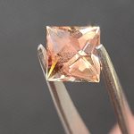 2.1ct Oregon Sunstone – Orangish Red with Green Edges and Golden Schiller, 7.5mm squre cut, USA Mined & Cut