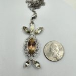 “Weird!” Oregon Sunstone Statement Pendant – 8ct Bicolor Center with 22 Surrounding Stones, 61mm Sterling Silver Design - Image 4