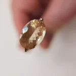 4.45ct Elongated Oval Oregon Sunstone – Peach with Sparkling Schiller - Image 3