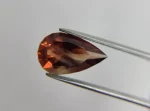 Raspberry Red Oregon Sunstone • 5.35ct Pear (16.1×9.5mm) • Silvery Schiller Banding • One-in-a-Million Collector Gem - Image 3