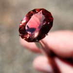 AAA Red Oregon Sunstone — 11.15ct (18 × 14 × 9 mm) with Light Copper Schiller