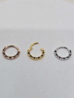 "Parvati" 14k Septum or daith clicker with Oregon Sunstone and black spinel