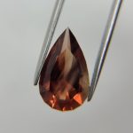 Raspberry Red Oregon Sunstone • 5.35ct Pear (16.1×9.5mm) • Silvery Schiller Banding • One-in-a-Million Collector Gem