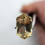 4.69ct Oregon Sunstone with green,  gold, and pink