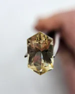 4.69ct Oregon Sunstone with green,  gold, and pink