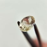 1.87ct Champagne with peach schiller oval Oregon Sunstone