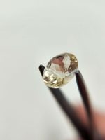 1.87ct Champagne with peach schiller oval Oregon Sunstone