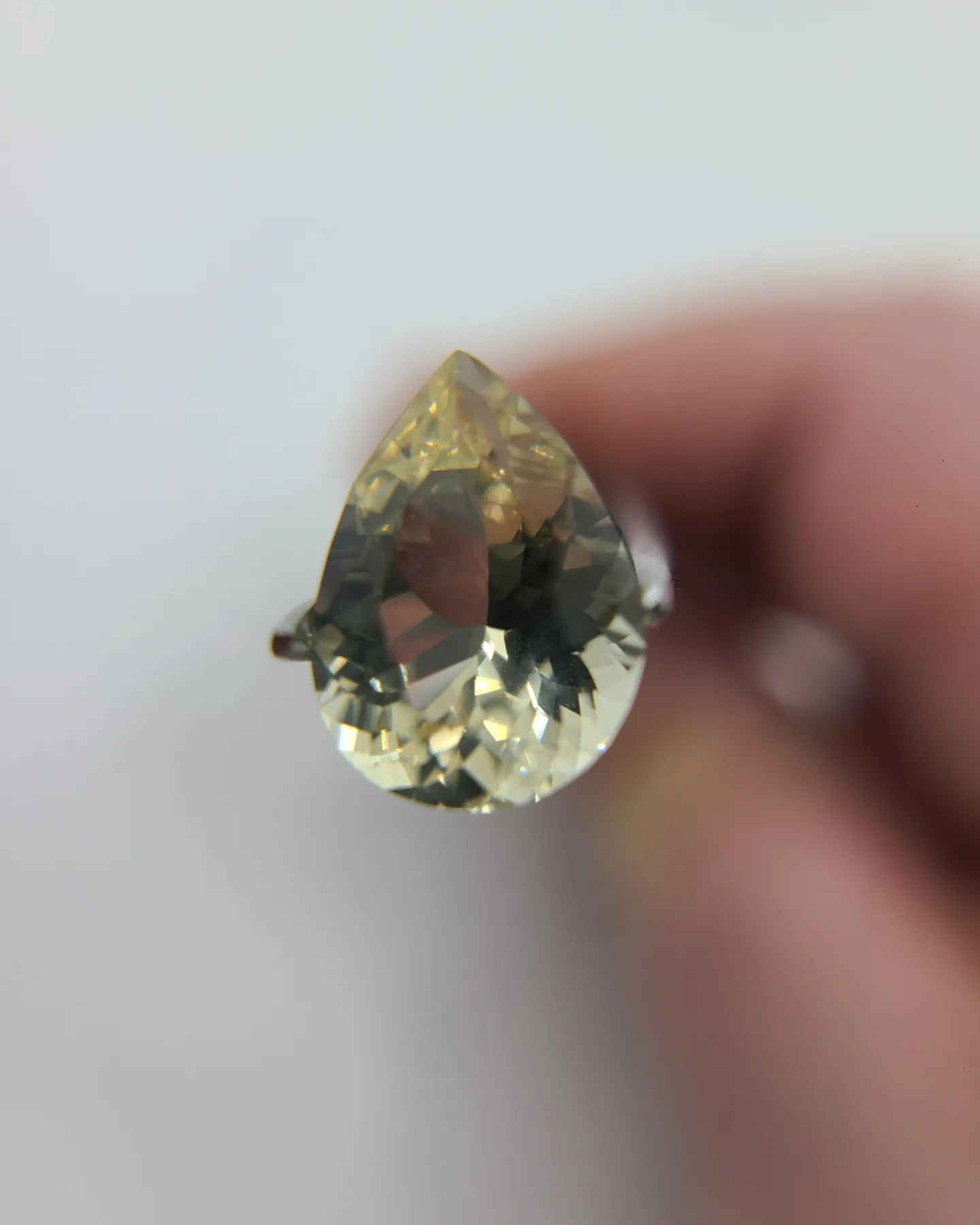 3909a2_bff808baf9ad45cfaeeeb952d33bfba3mv2.webp 4.18ct Champagne colored pear Oregon Sunstone - Image 1