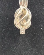 Faceted Oregon Sunstone beadcage pendant - Image 4