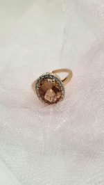 Oregon Sunstone and moissanite ring set in 14k Rose Gold