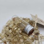 Bottle of Tumbled Oregon Sunstone, some with schiller